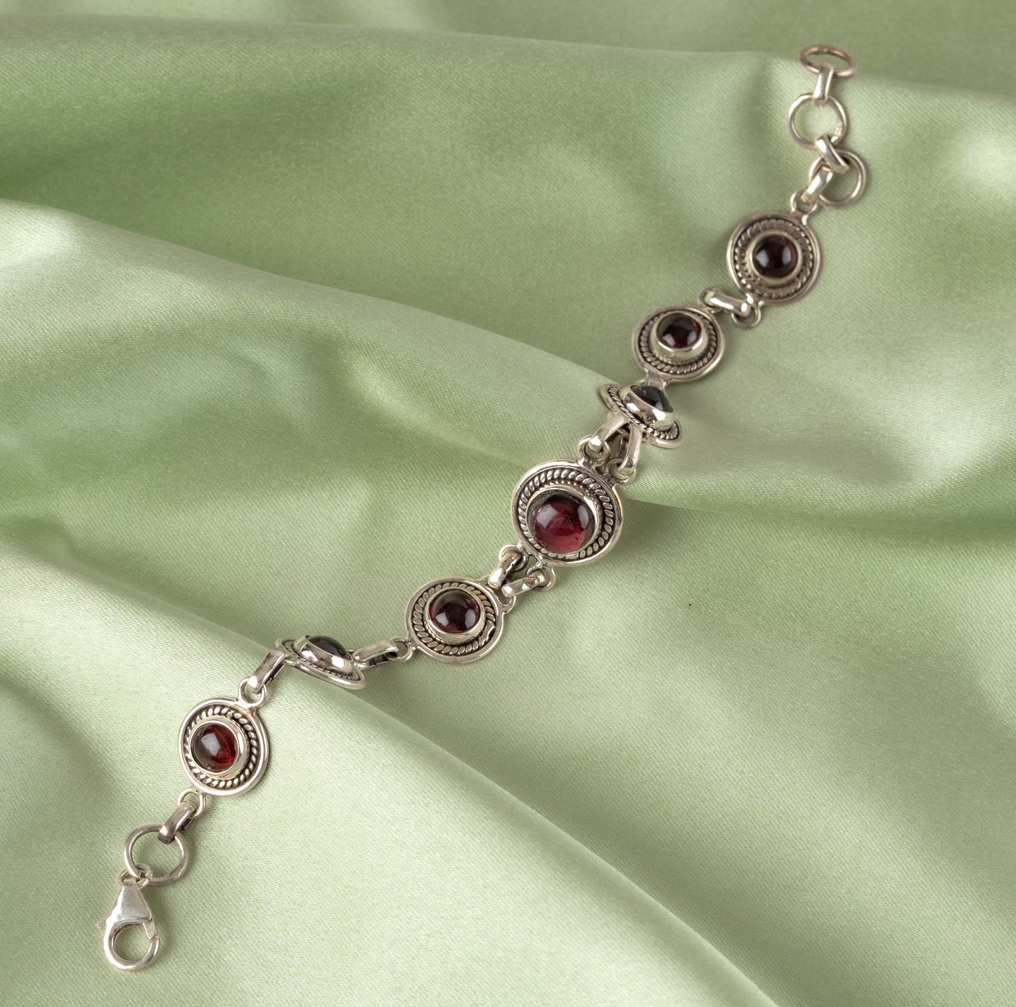 Graduated Garnet and Silver Bracelet