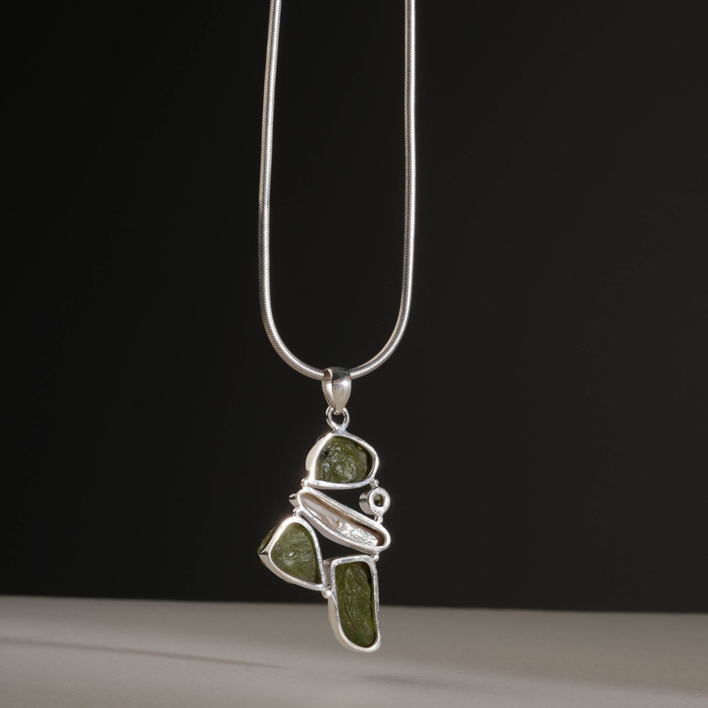 Elegant Silver Pendant with Peridot Stone