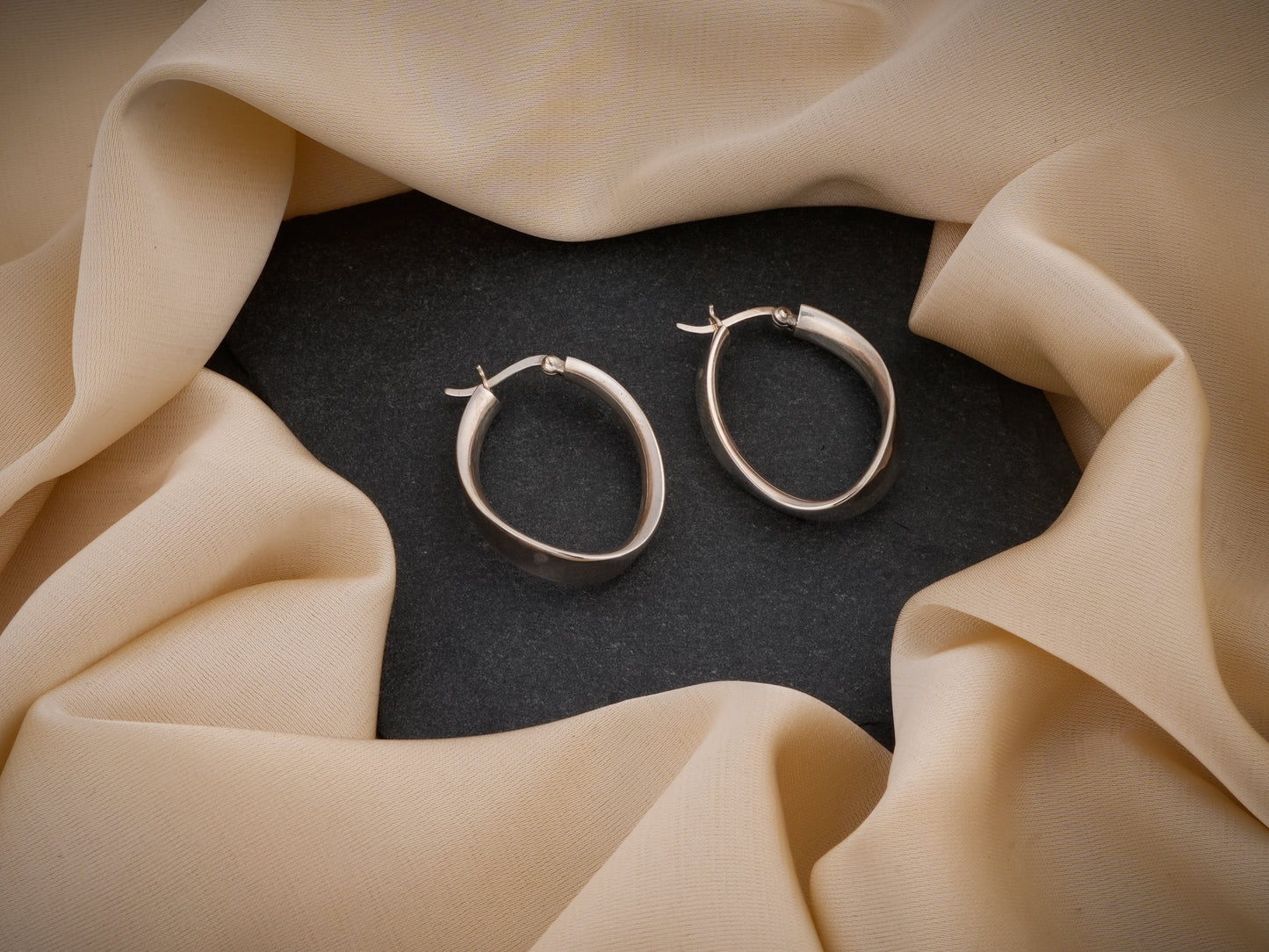 Oval Ribbon Silver Hoops