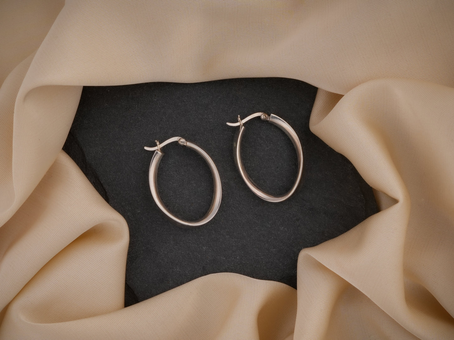 Oval Ribbon Silver Hoops