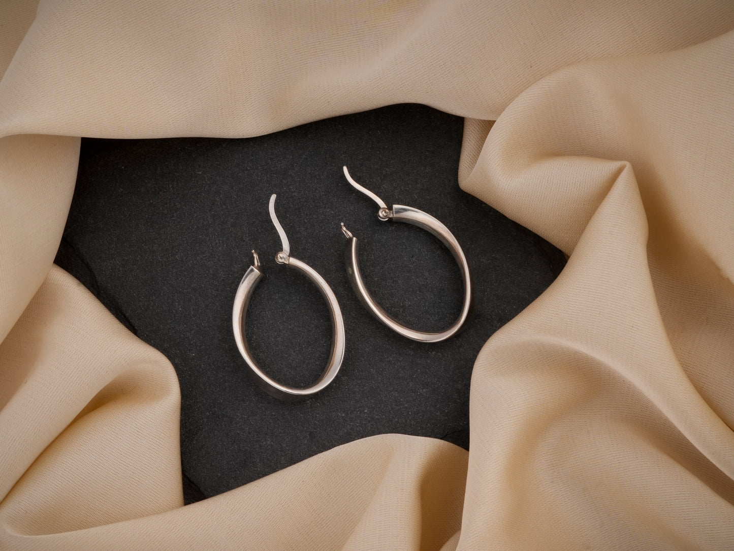 Oval Ribbon Silver Hoops
