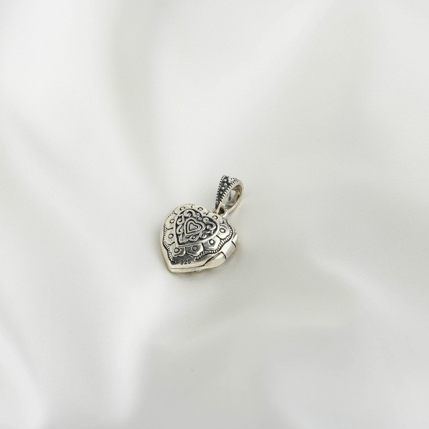 Eternal Embrace: Open Heart Marcasite Pendant