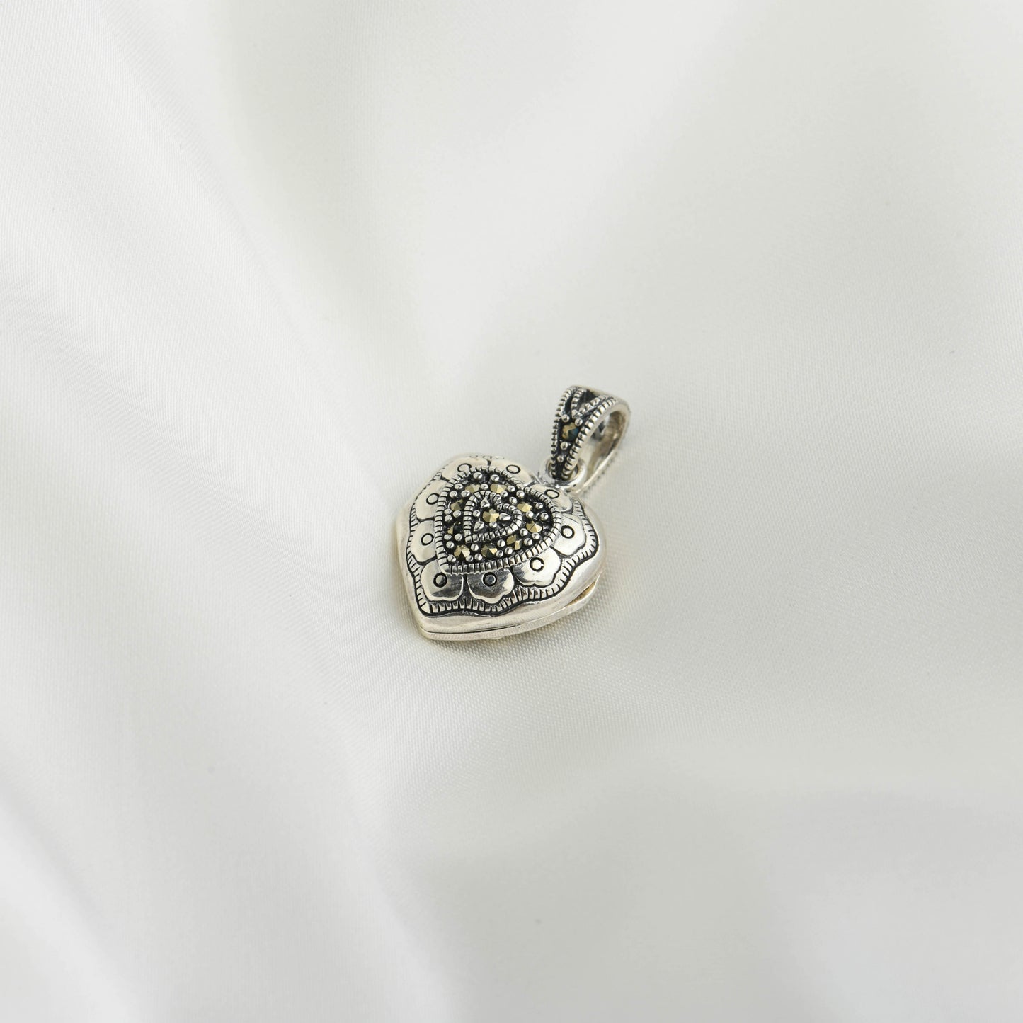 Eternal Embrace: Open Heart Marcasite Pendant