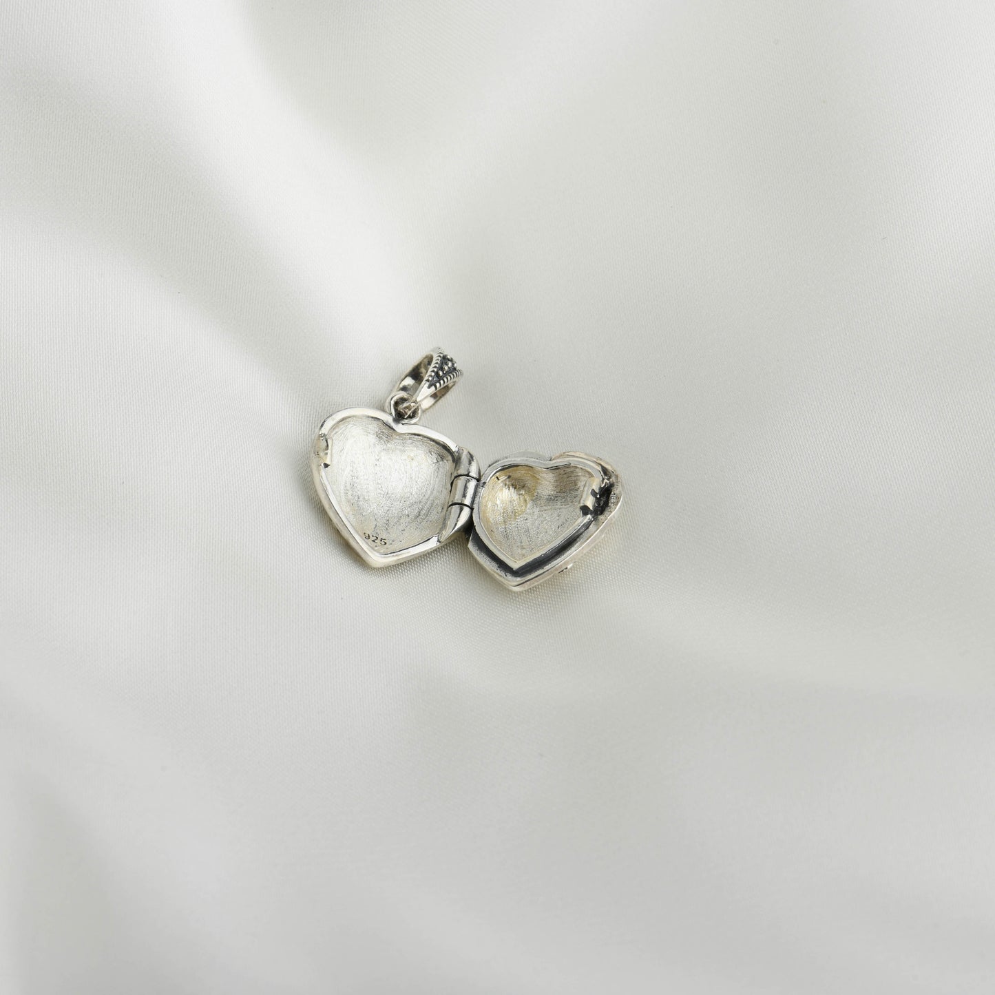 Eternal Embrace: Open Heart Marcasite Pendant