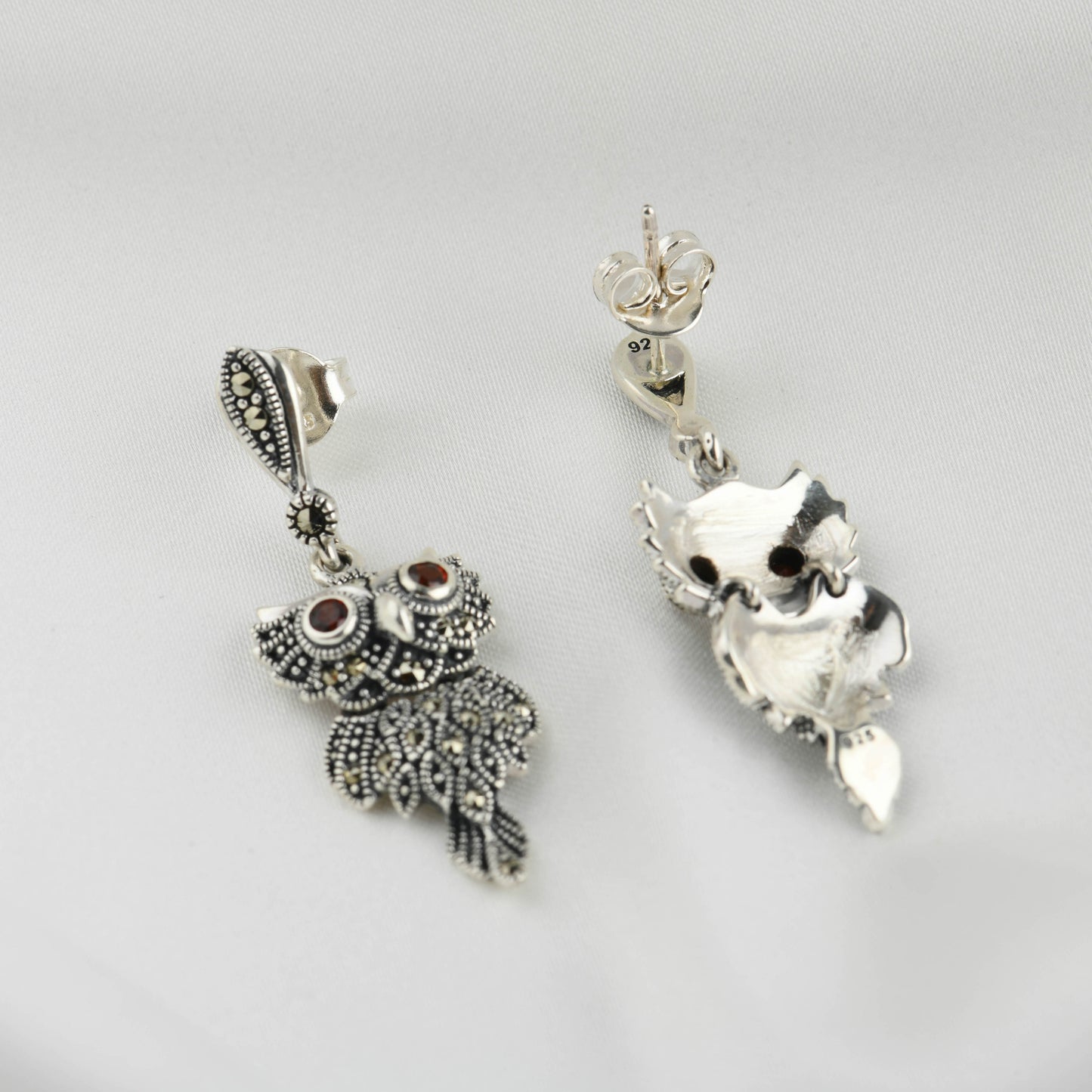 Garnet-Gleaming Owl Silver Marcasite Drop Earrings