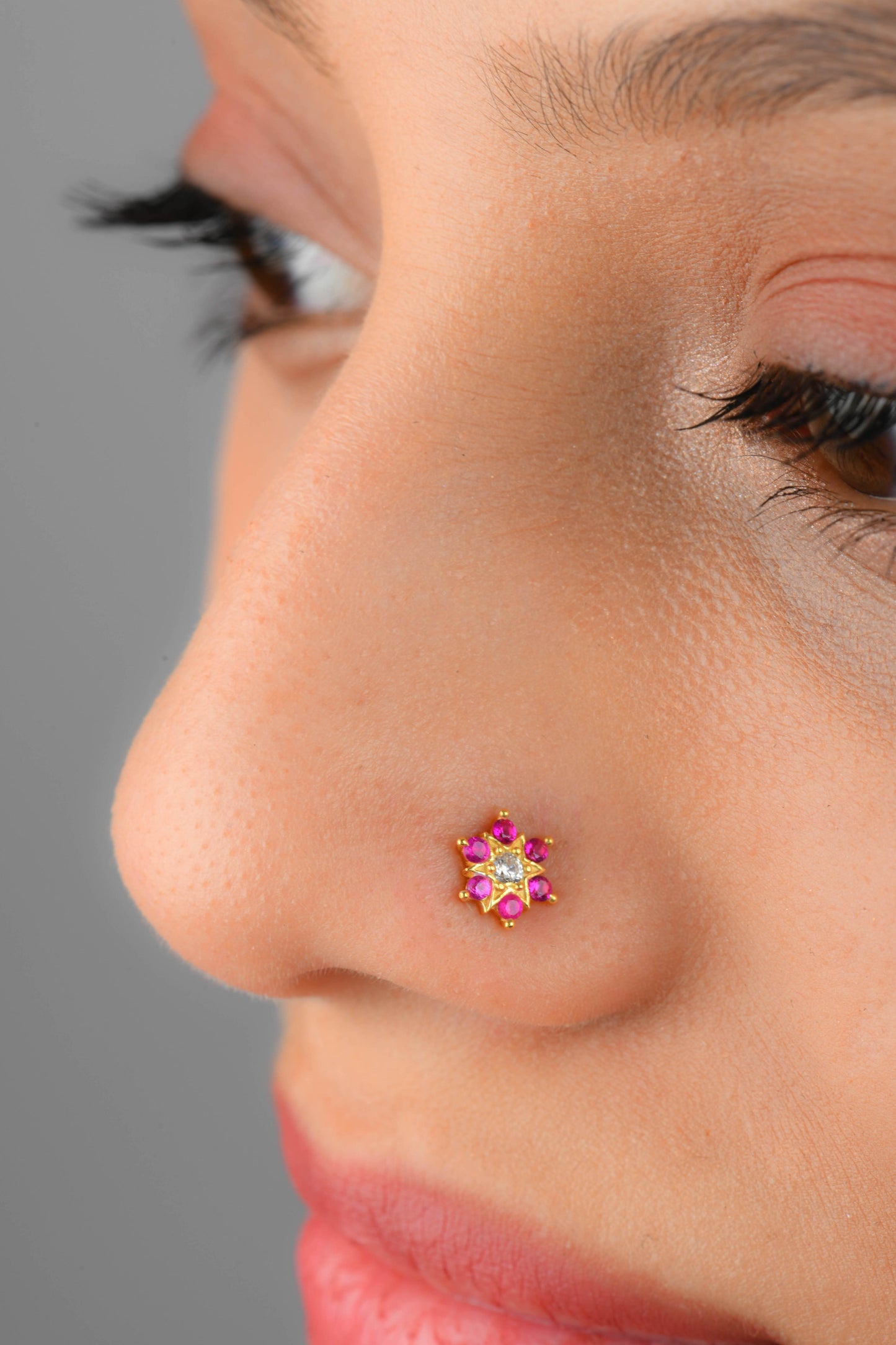 Shimmering Star Gold Plated Silver Nose Pin