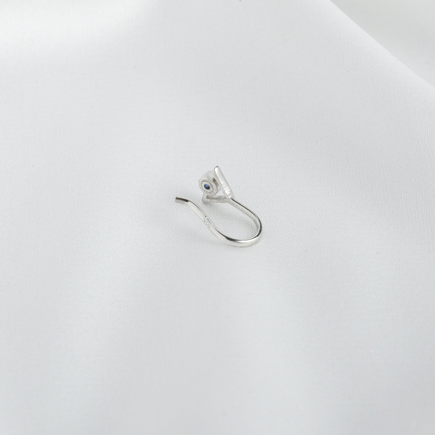 Trikone Blue CZ Silver Nose Pin