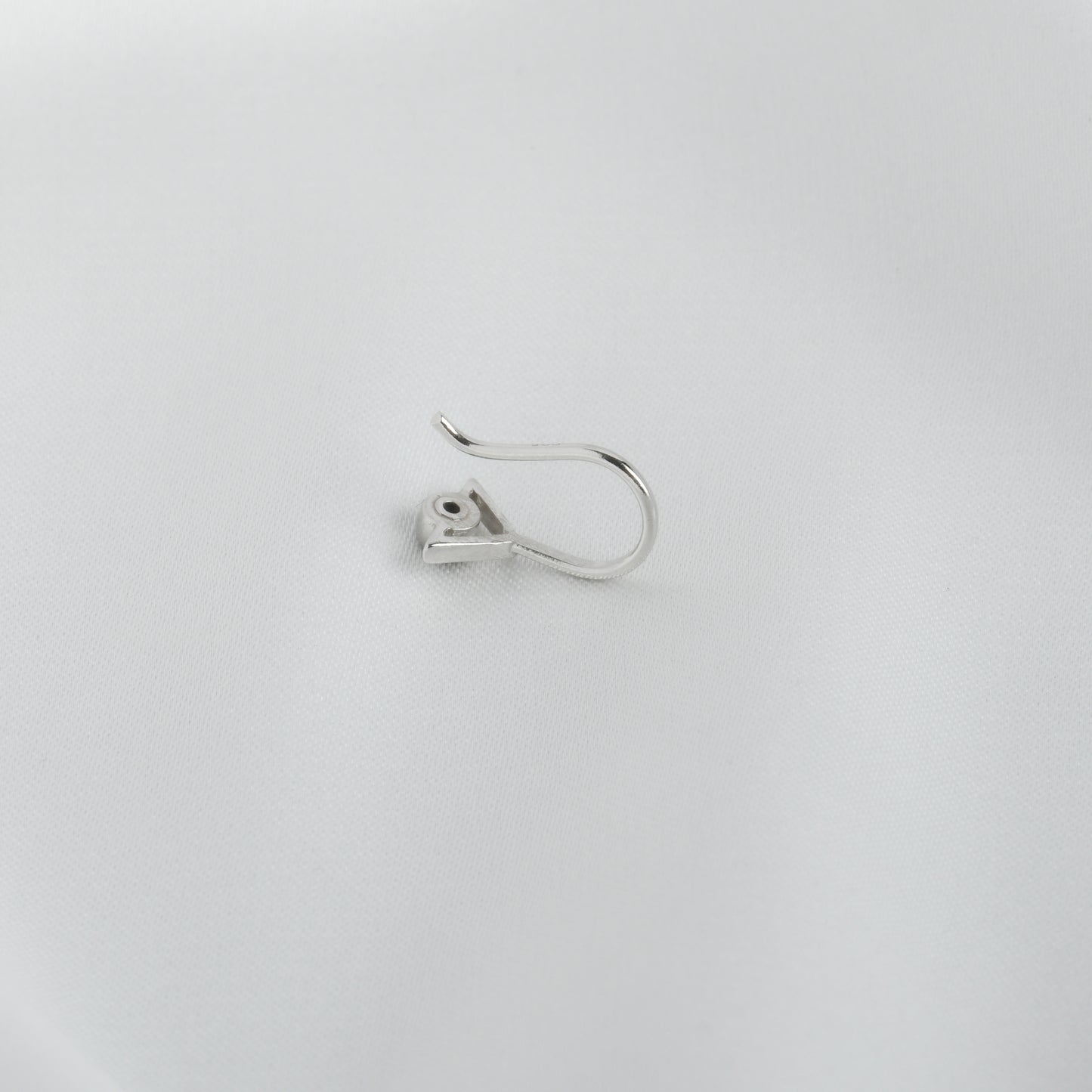 Trikone Blue CZ Silver Nose Pin