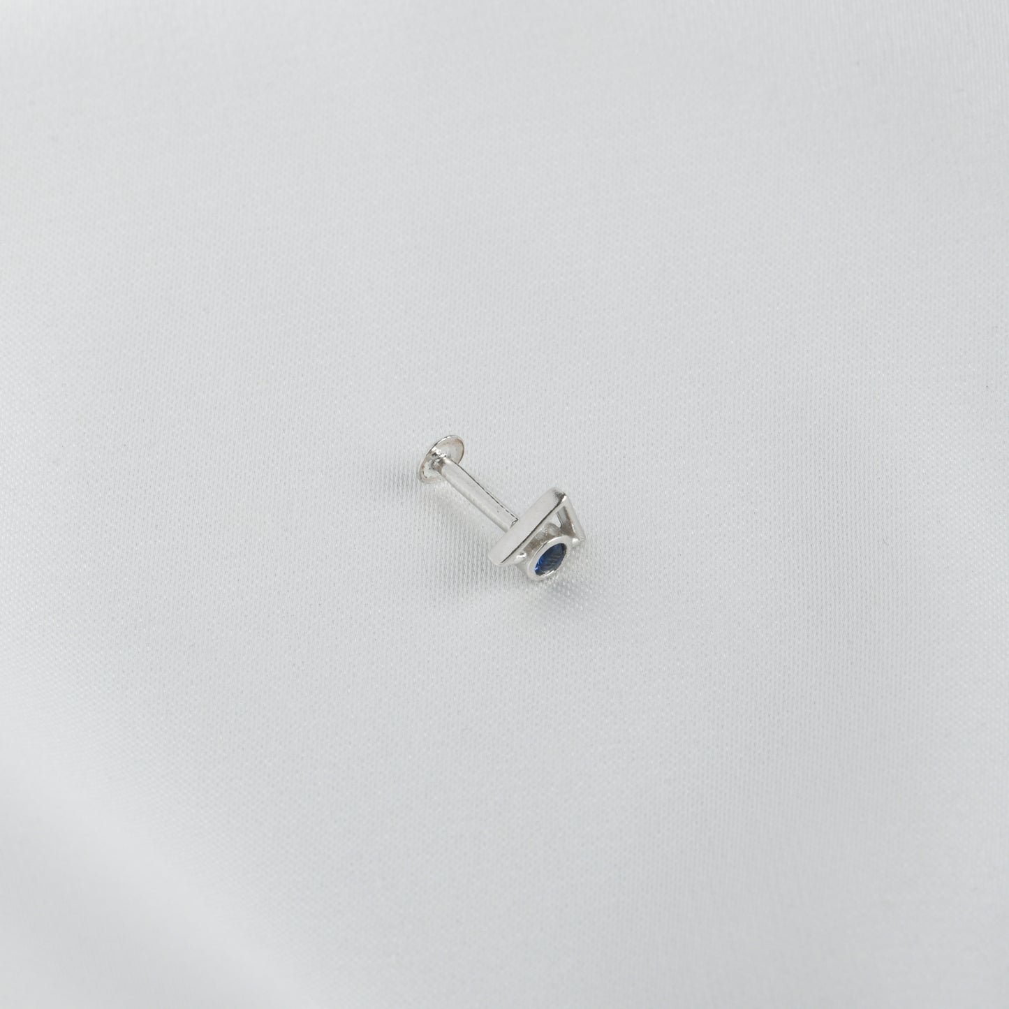 Trikone Blue CZ Silver Nose Pin