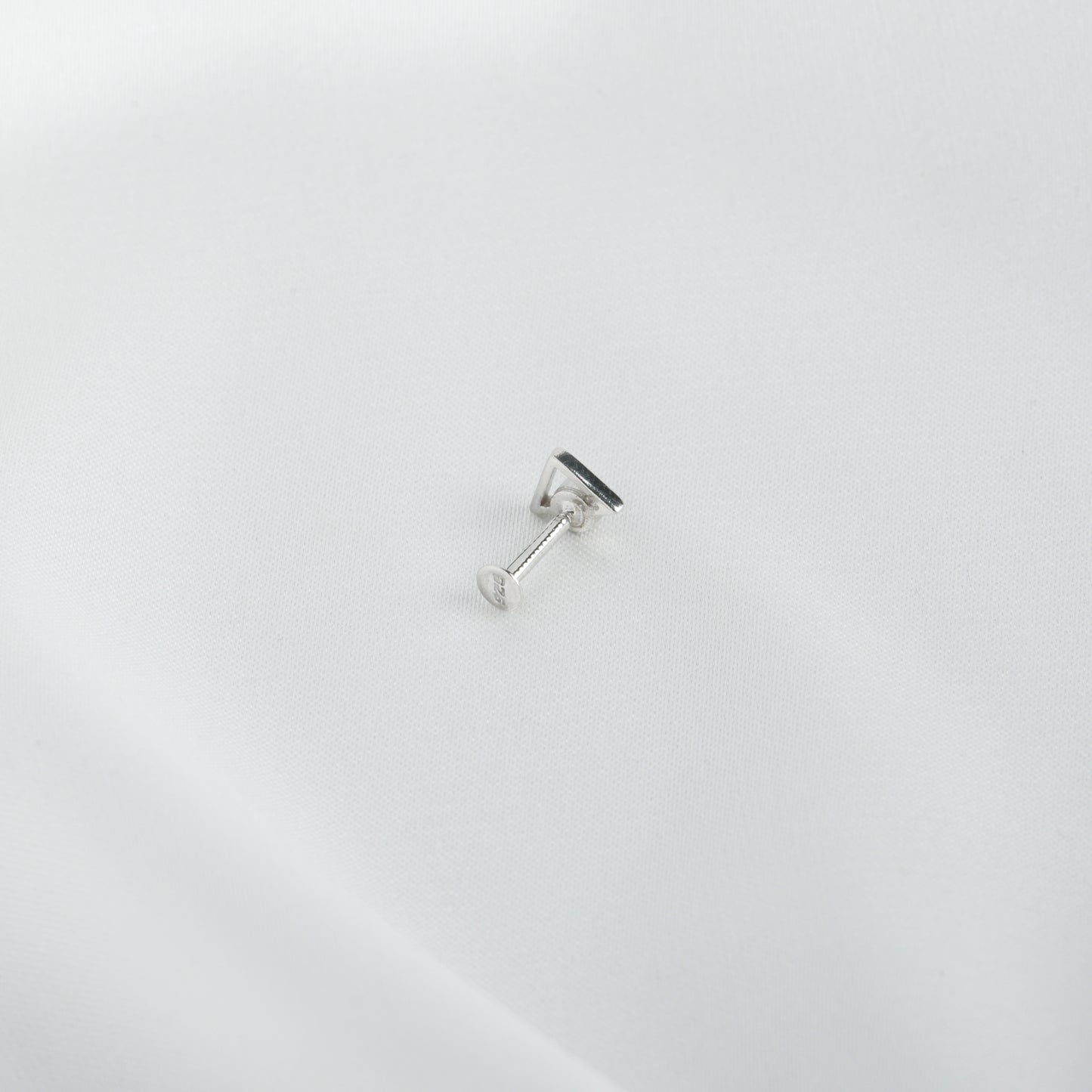 Trikone Blue CZ Silver Nose Pin