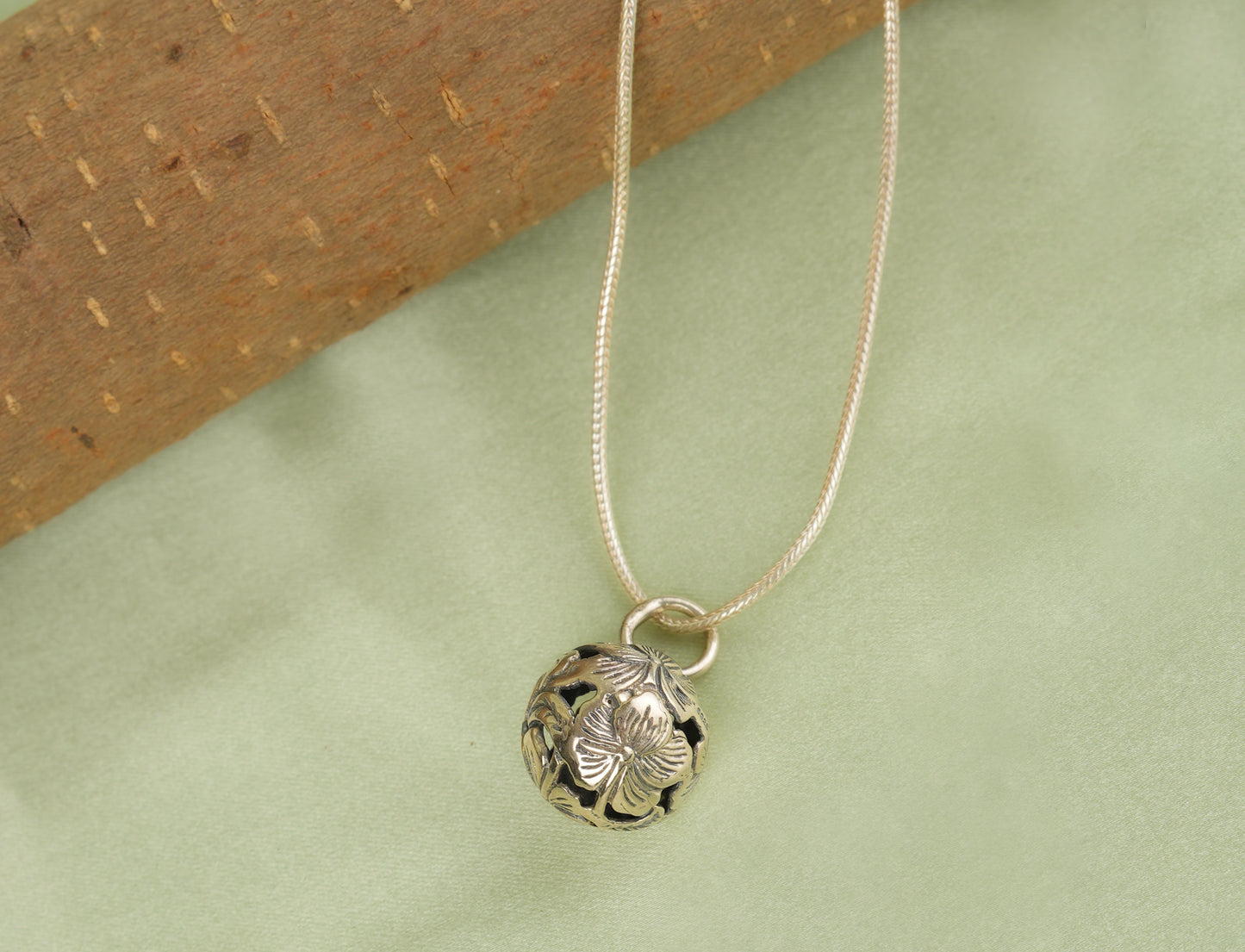 Silver Woven Flower Ball Pendant
