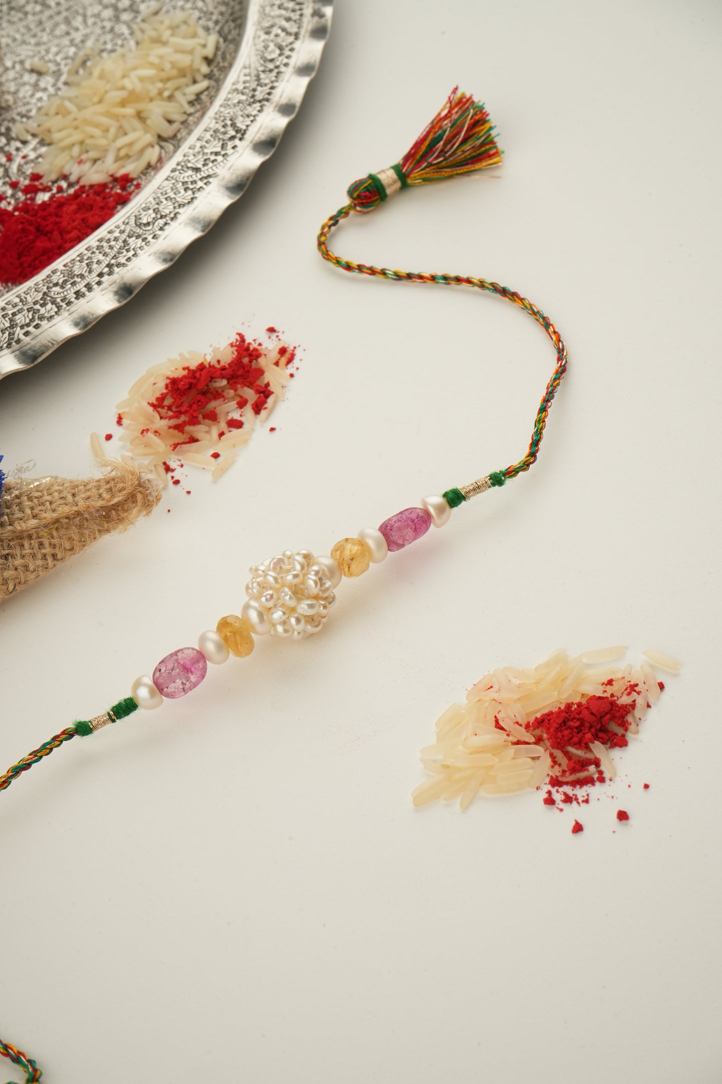 Sacred Woven Pearl Rakhi