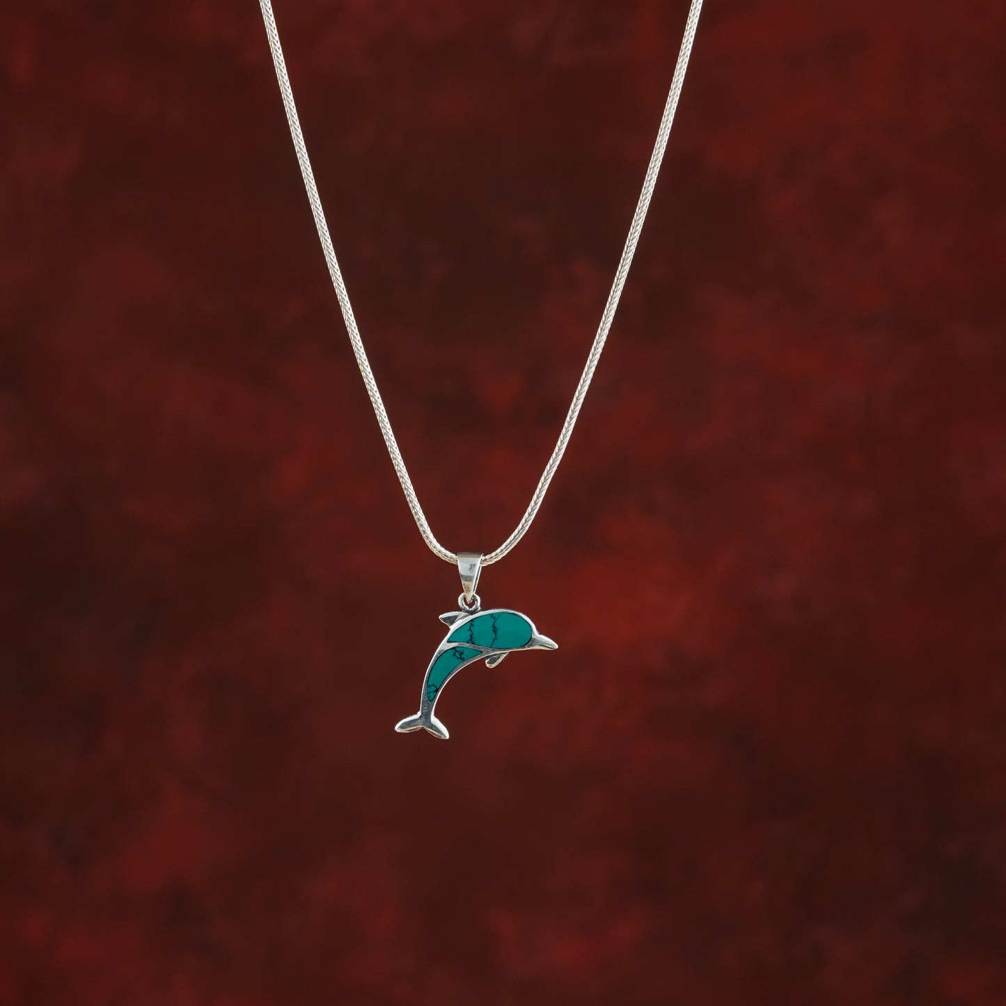 Teal Dolphins in Silver