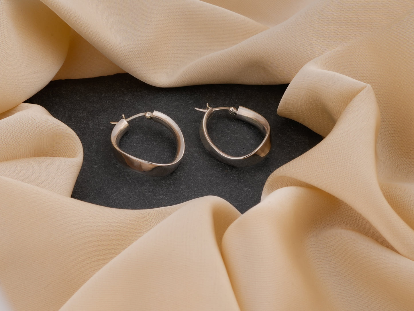 Oval Ribbon Silver Hoops