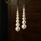Bold Graduated Pearl Danglers