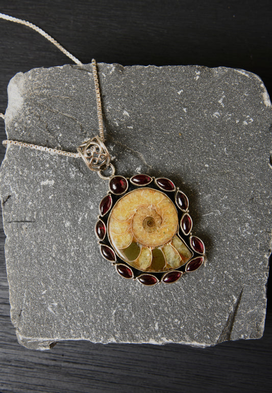 Ammonite And Garnet Silver Pendant