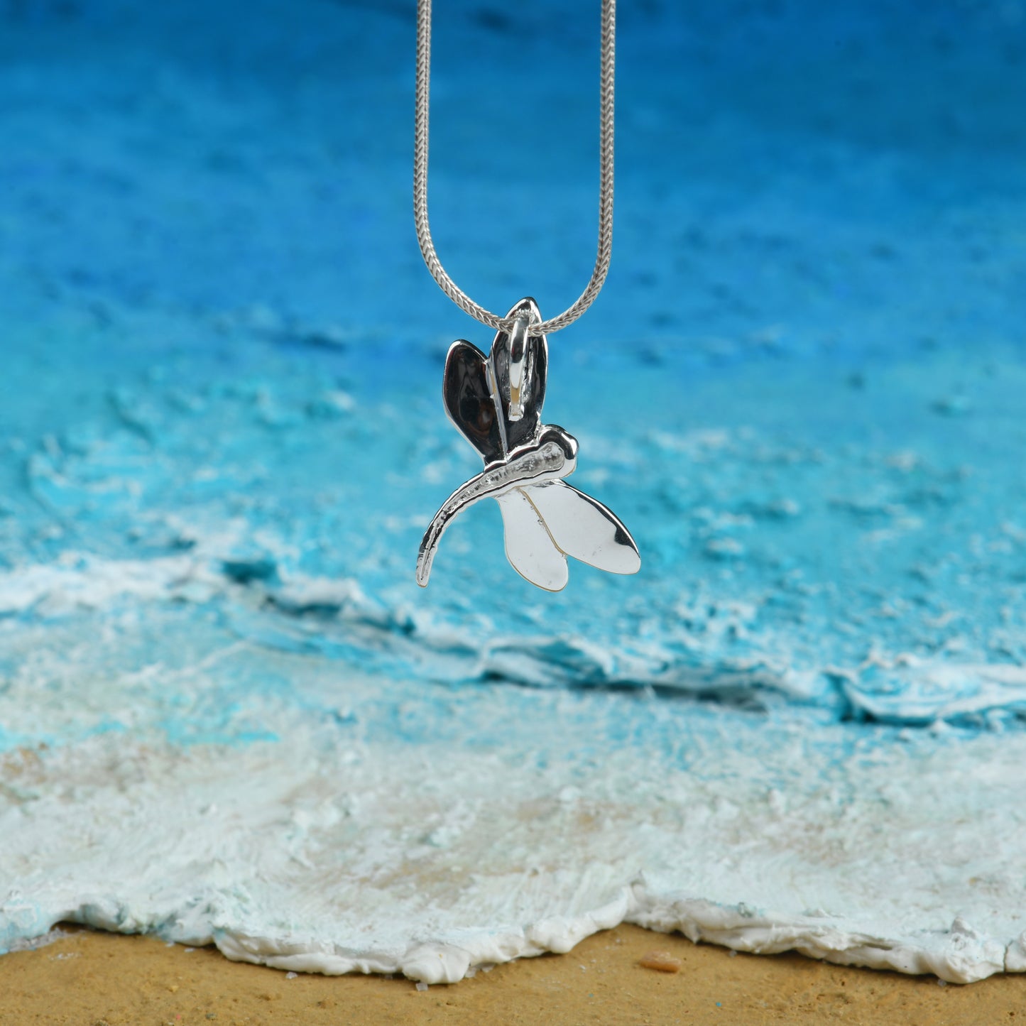 The Blue Mop Silver Dragon Fly