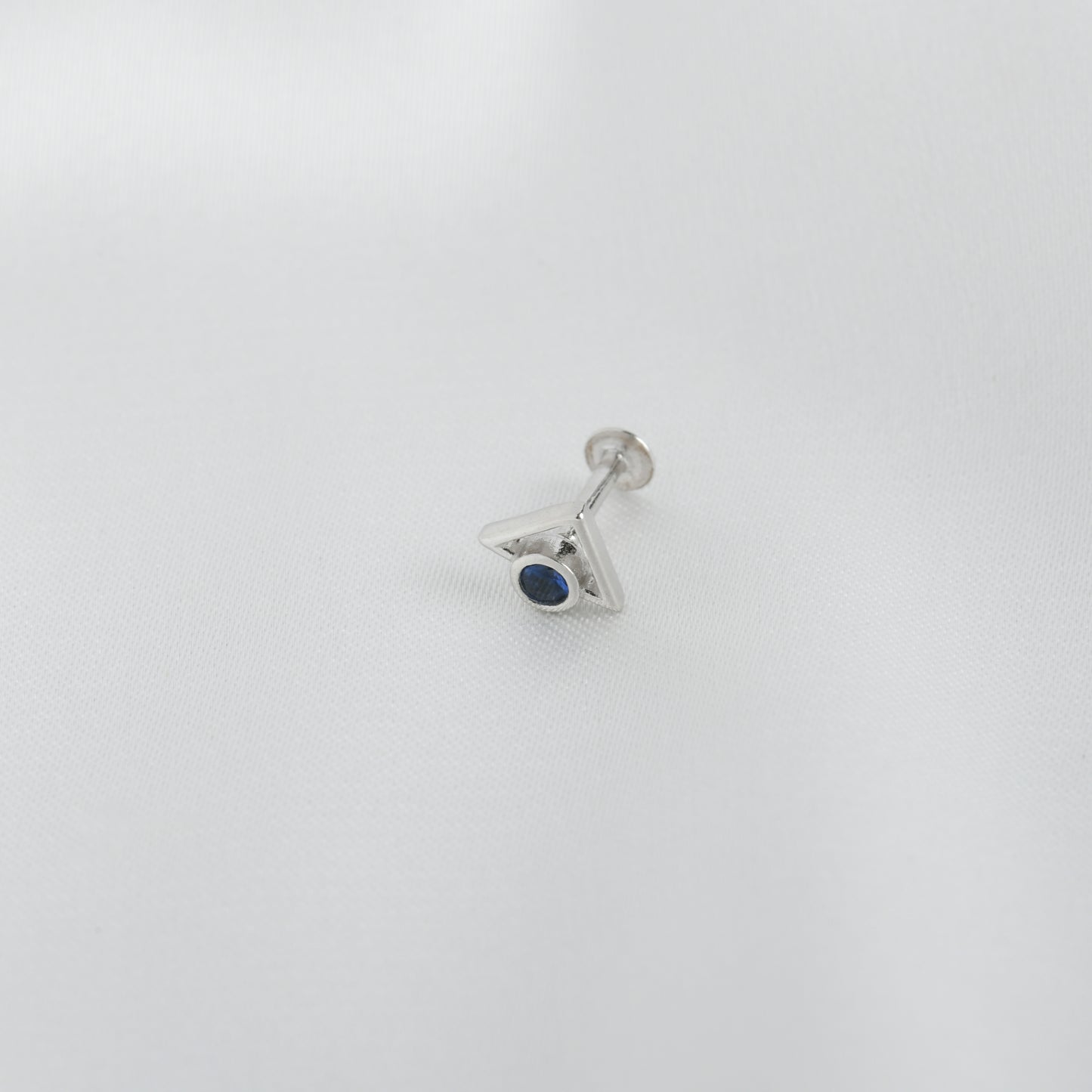 Trikone Blue CZ Silver Nose Pin