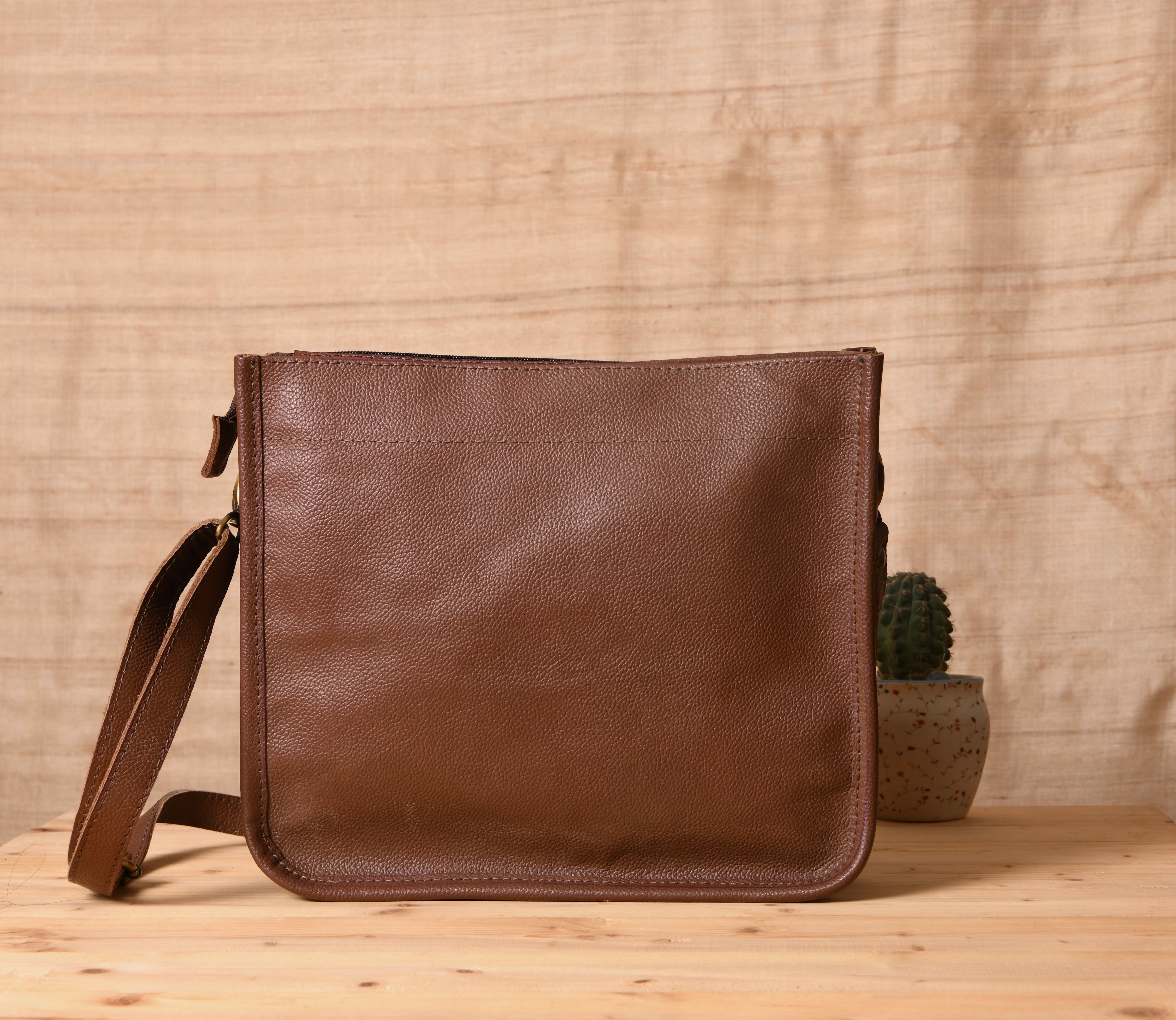 Buy Kutchi Leather Craft online | Kutchi leather Bucket shaped Sling Bag