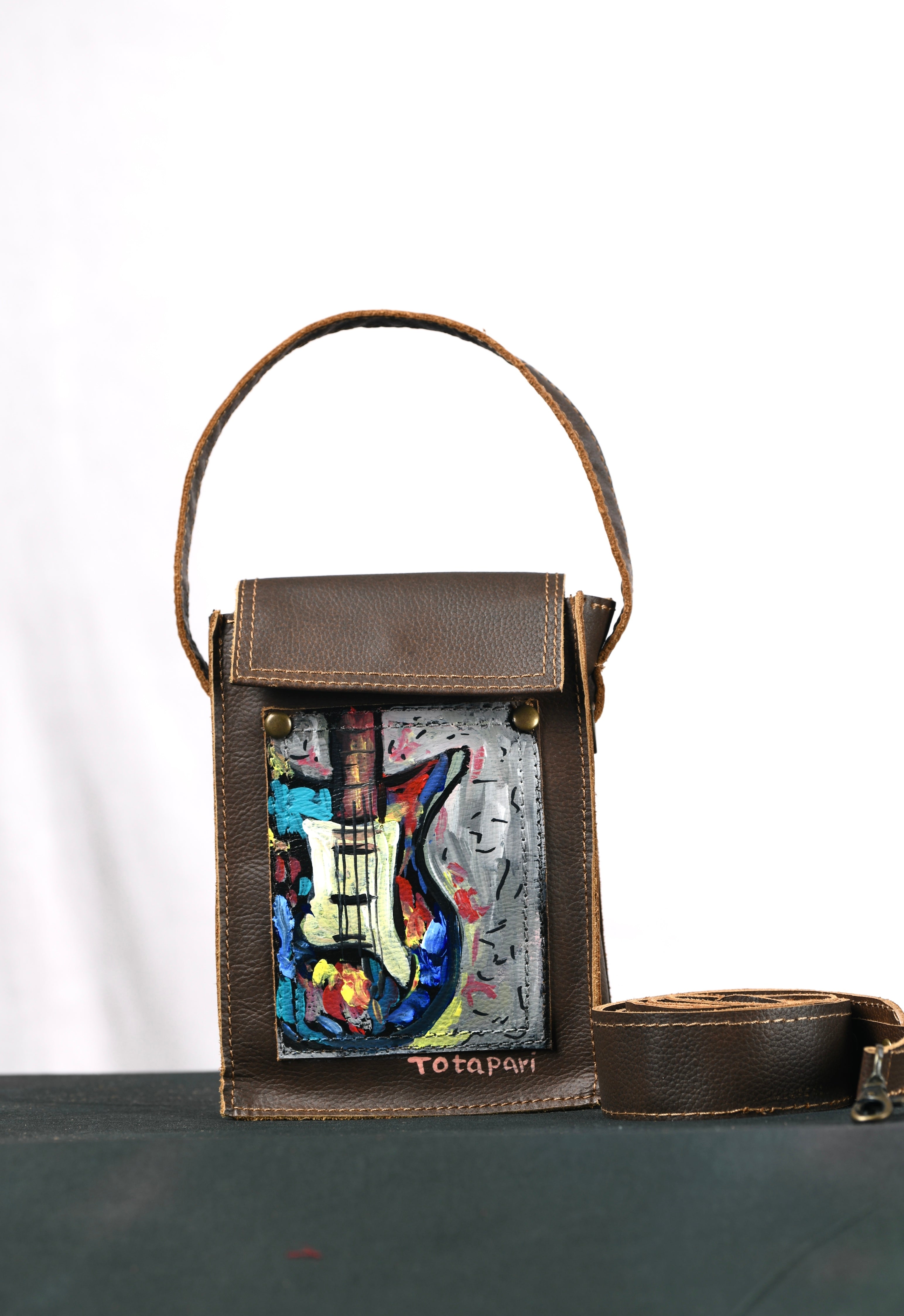 Premium Photo | Brightly colored hand painted leather bag with a womans  face generative ai